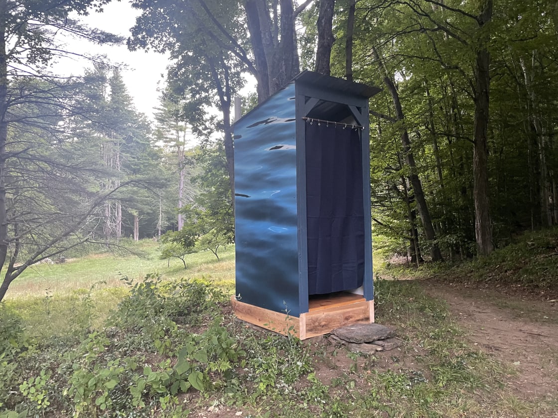 Most potties can't be described as fun or interesting, but we think ours can! We used art from local artisans to build this unique structure. 