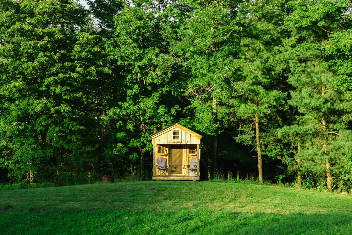 One of the tiny cabins that are also available for rent.