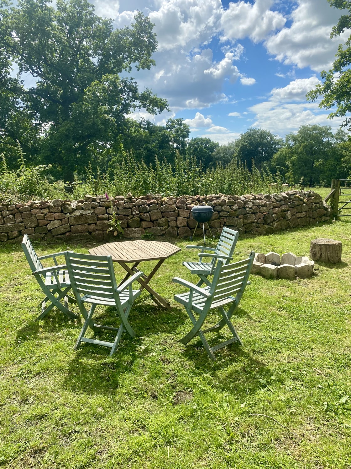 Our outdoor seating area complete with fire pit for toasting marshmallows by and the barbecue for those alfresco meals.