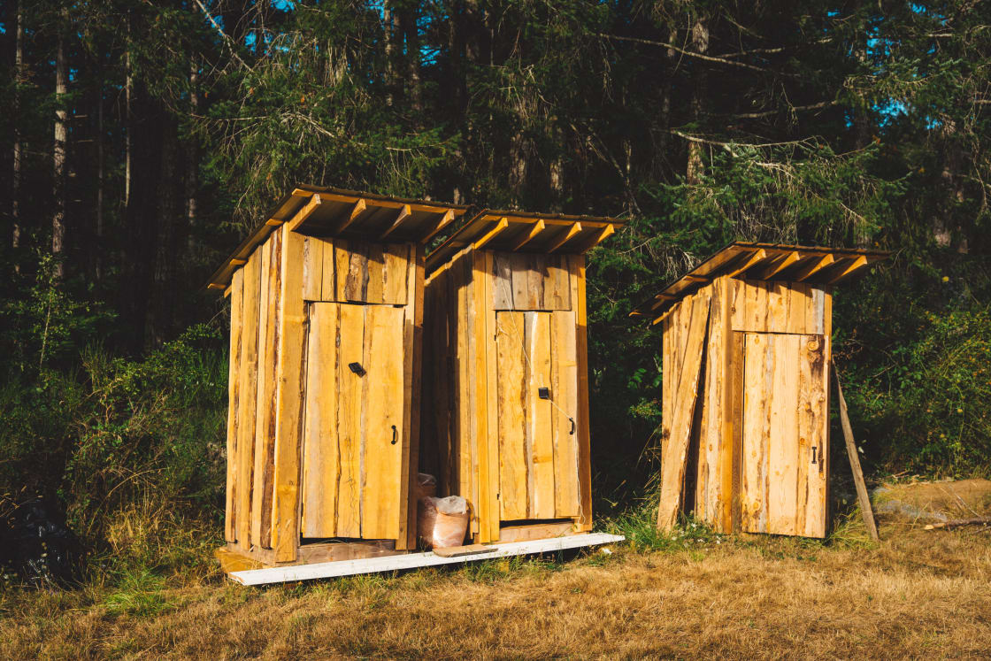 The outhouses.