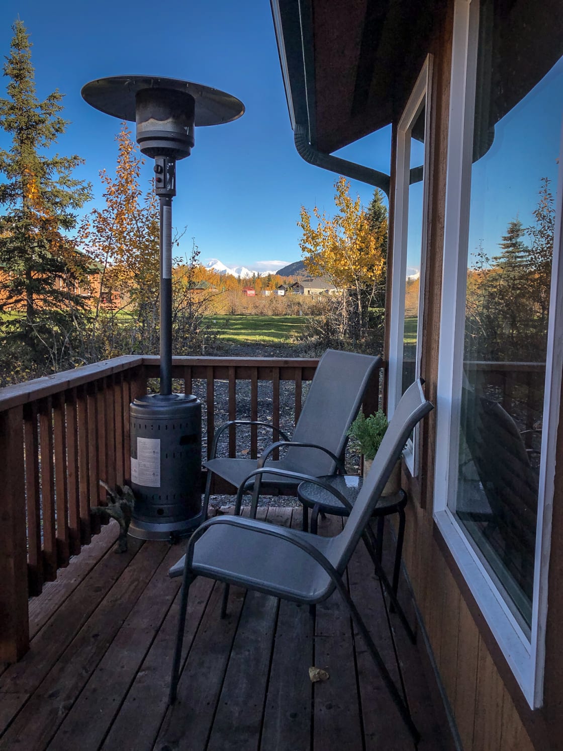 Enjoy sitting on the deck taking in the surrounding mountains while staying warm under the heater. 