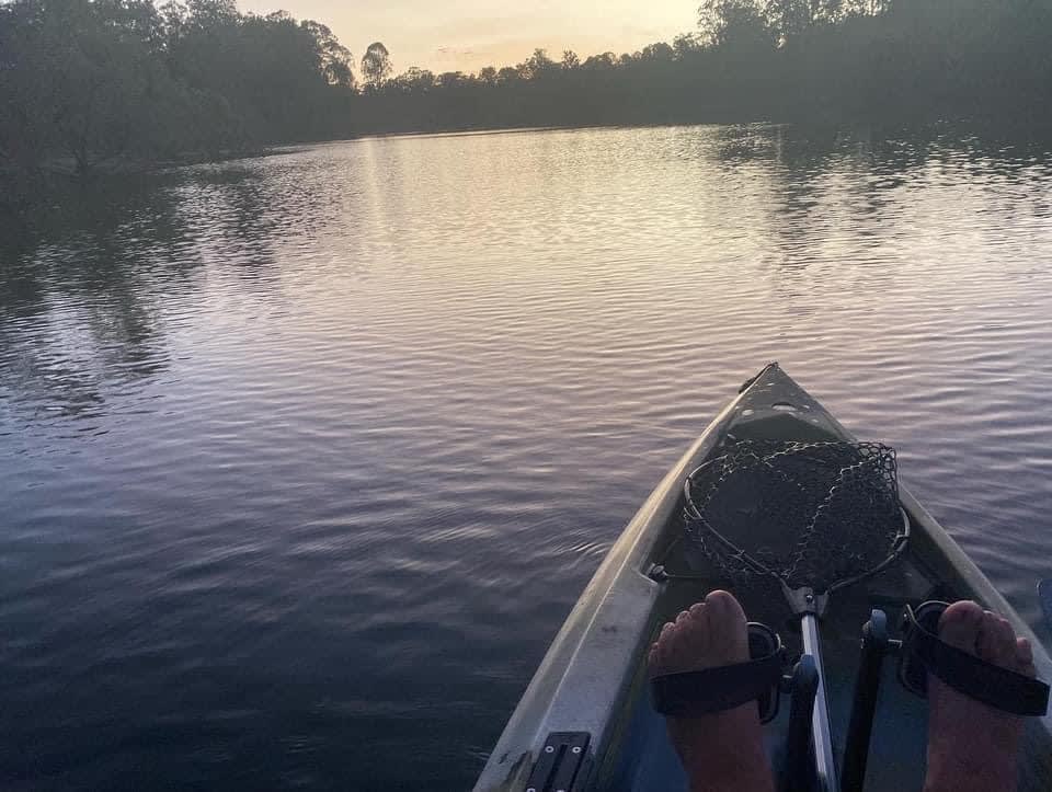 Sunet fishing in the kayak