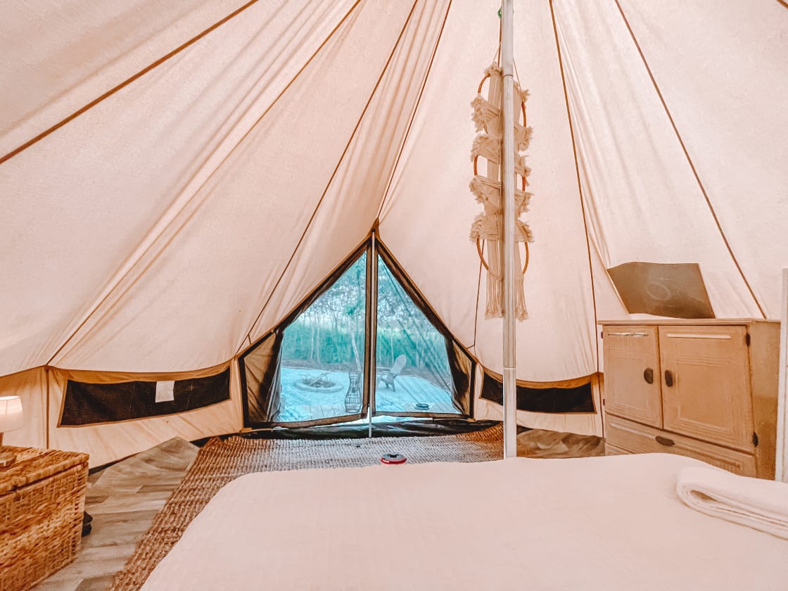 Nice 16’x16’ bell tent with a queen size bed. This is your view to the outside.
