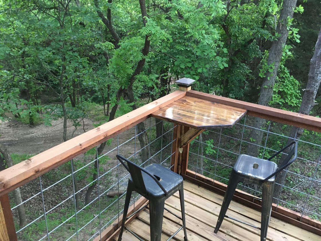 Enjoy your coffee on the deck with the creek below. 