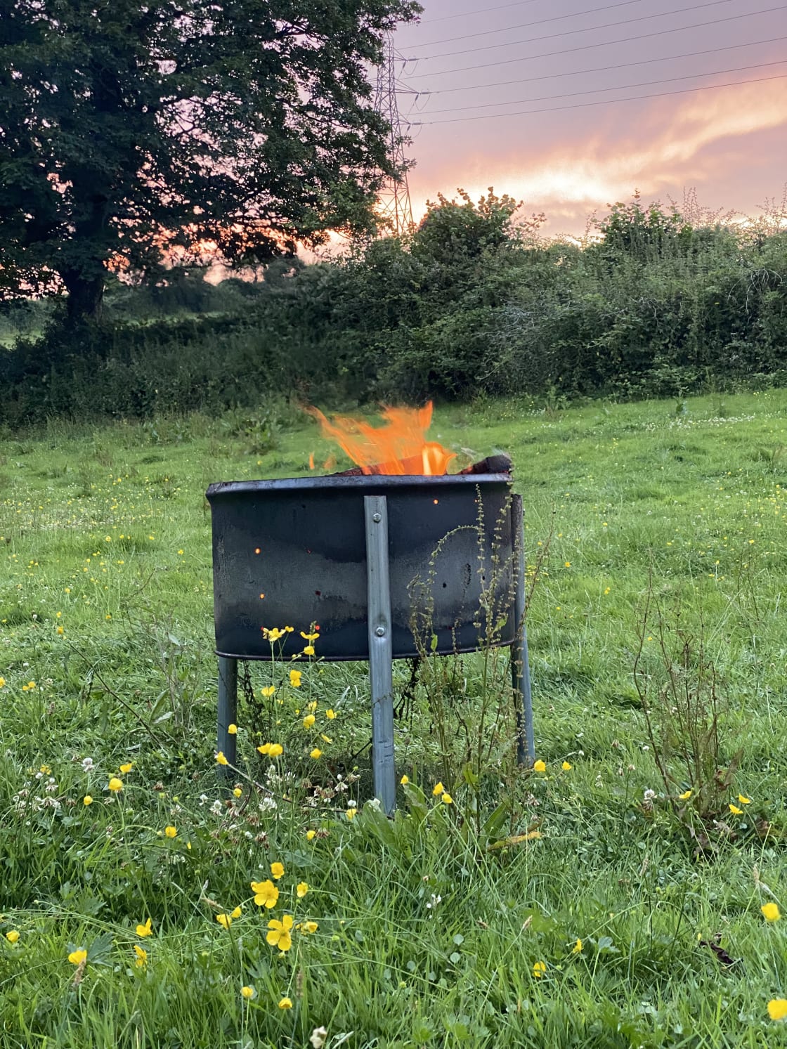 A fire pit is supplied with each pitch