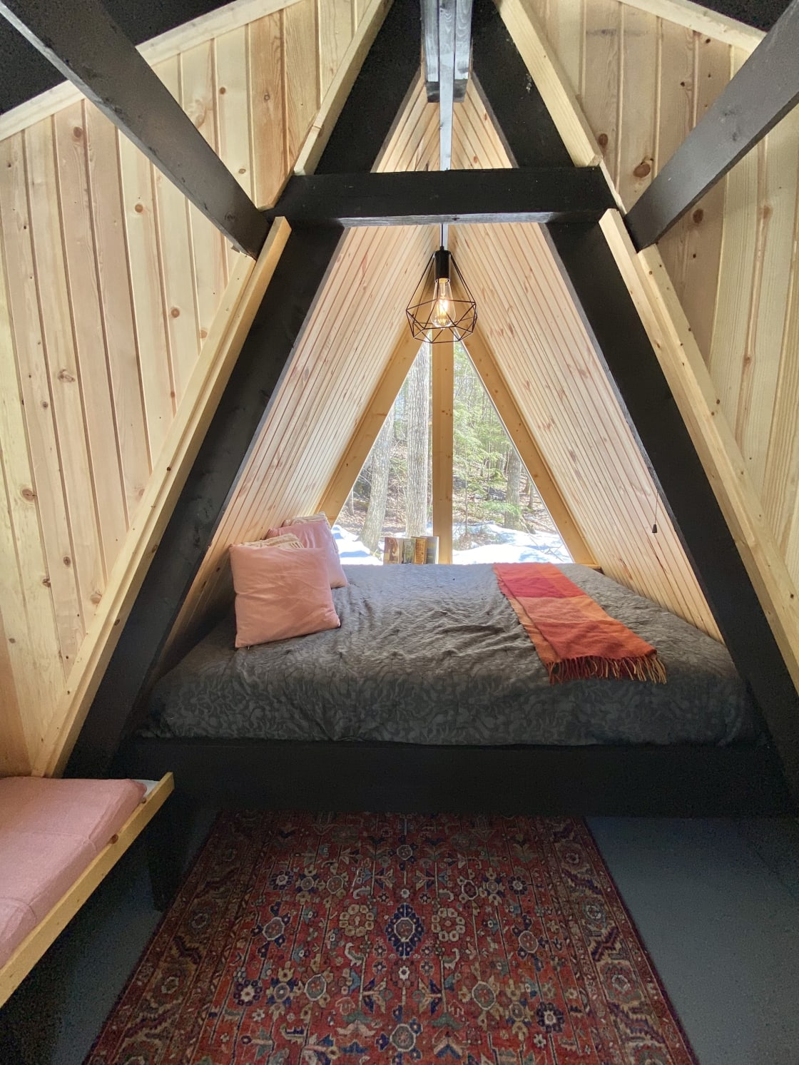 A cozy queen size pillow top bed is the ultimate glamping  luxtury. 