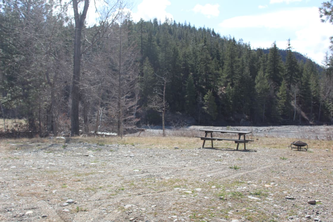 Camping area with creek just past picnic table