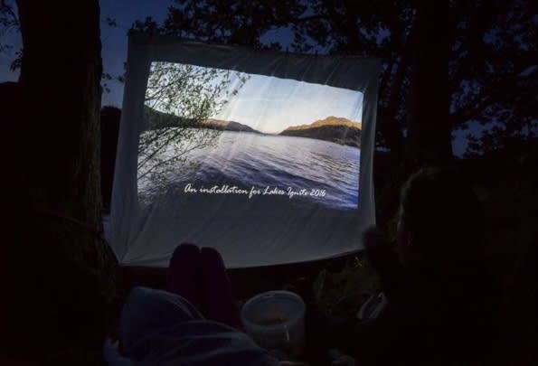 Outdoor movie theatre with power jack for nightly entertainment 🎞️🍿📽️