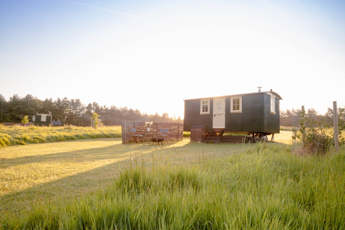The morning sun cast its light over the meadow and surrounding huts. A great way to start the day.