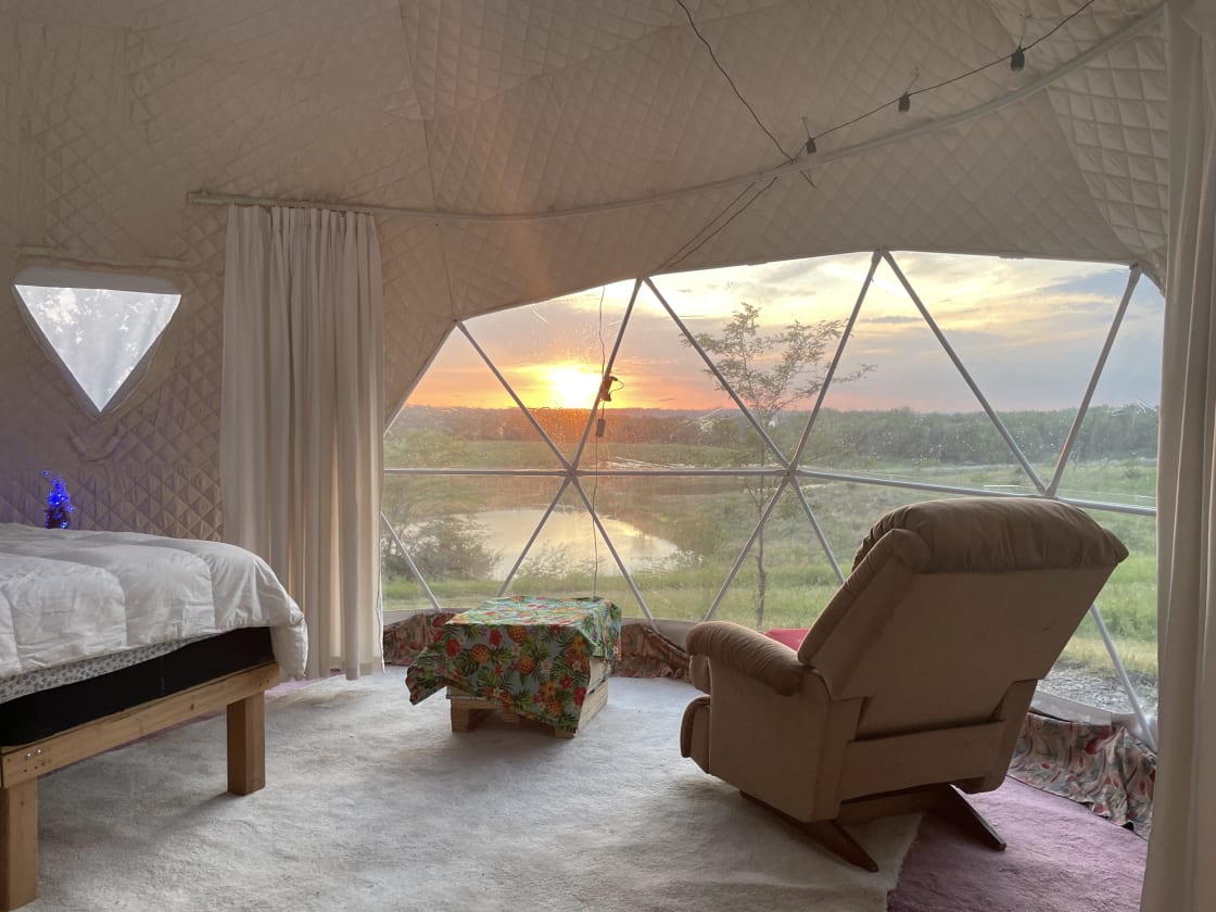 An amazing view of sunsetting can be viewed inside the dome if weather conditions permit. Inside dome has  king size bed, a sofa, a small table.  