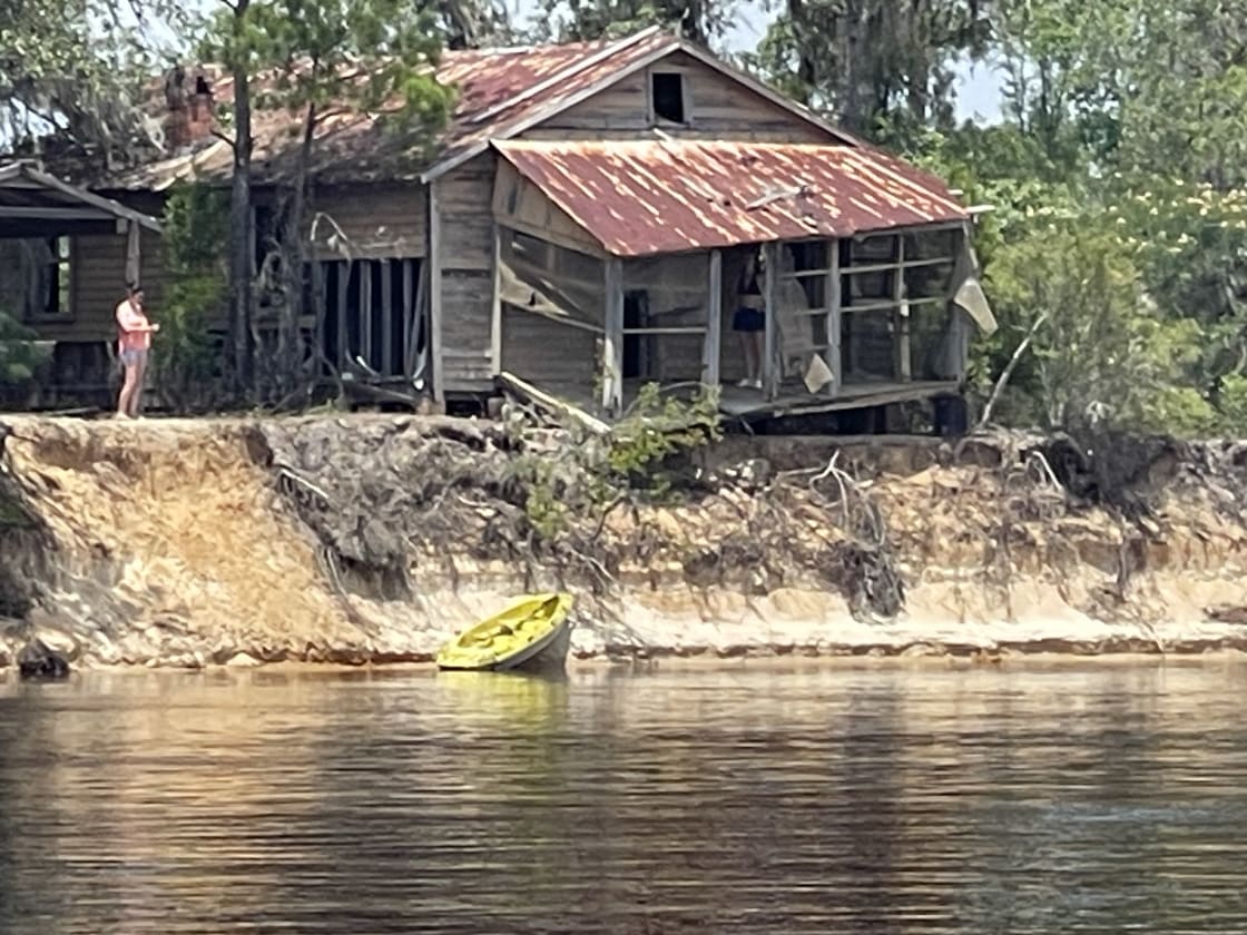 Old home on the river across from the River Oak site 