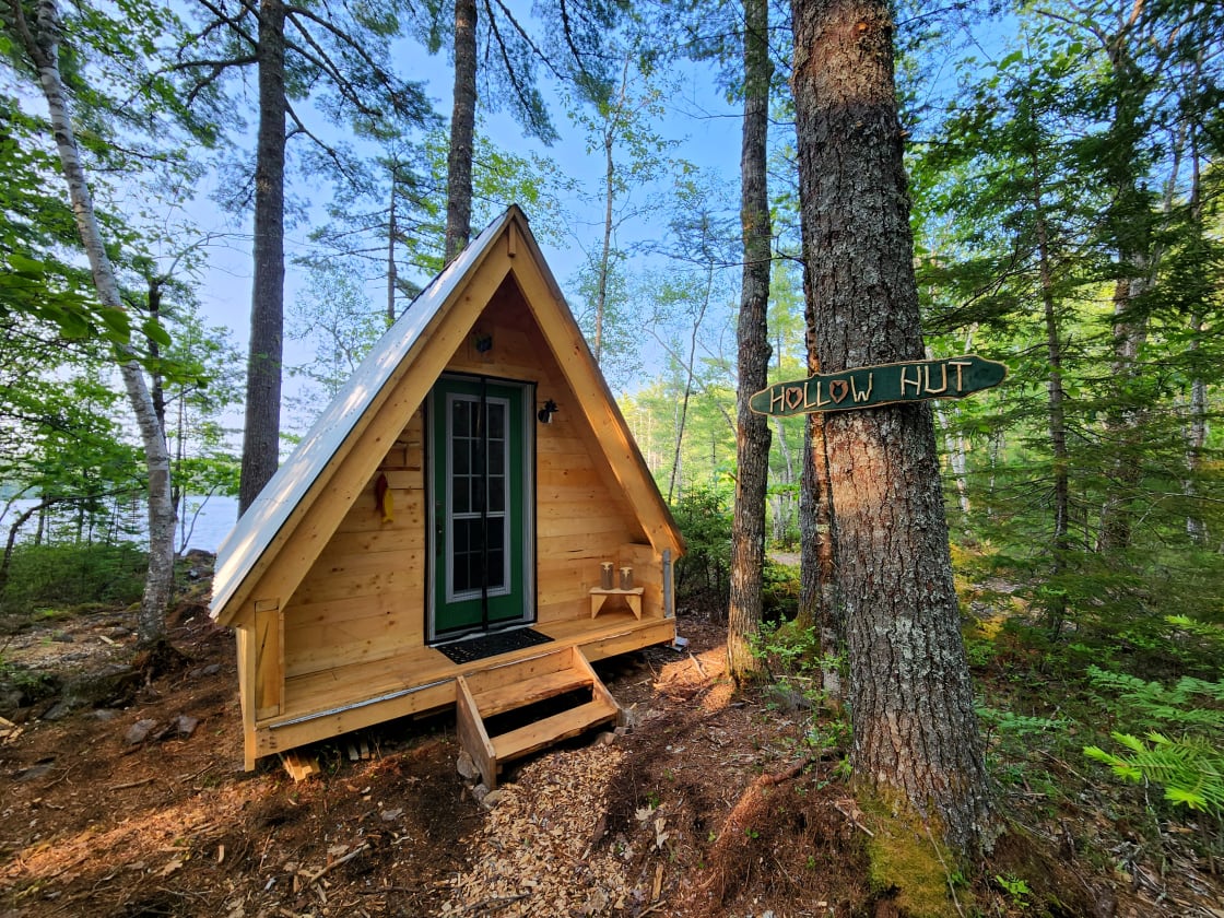 Our 10x10 Hollow Hut - sleeps 2 comfortably. Equipped with futon and small table and chairs.