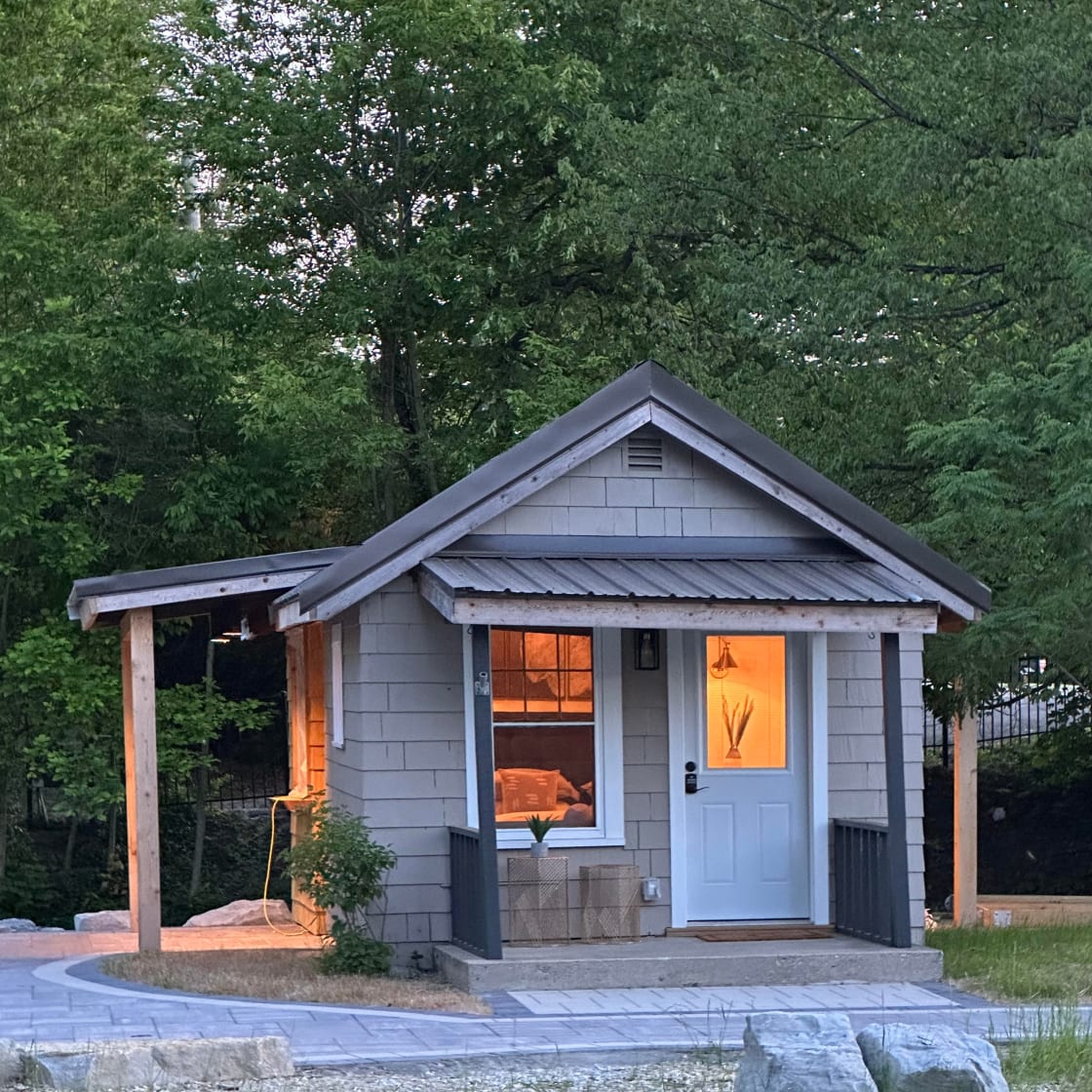 Our cozy tiny cabin consists of a studio-style single bedroom with a phenomenal lake-front view!
