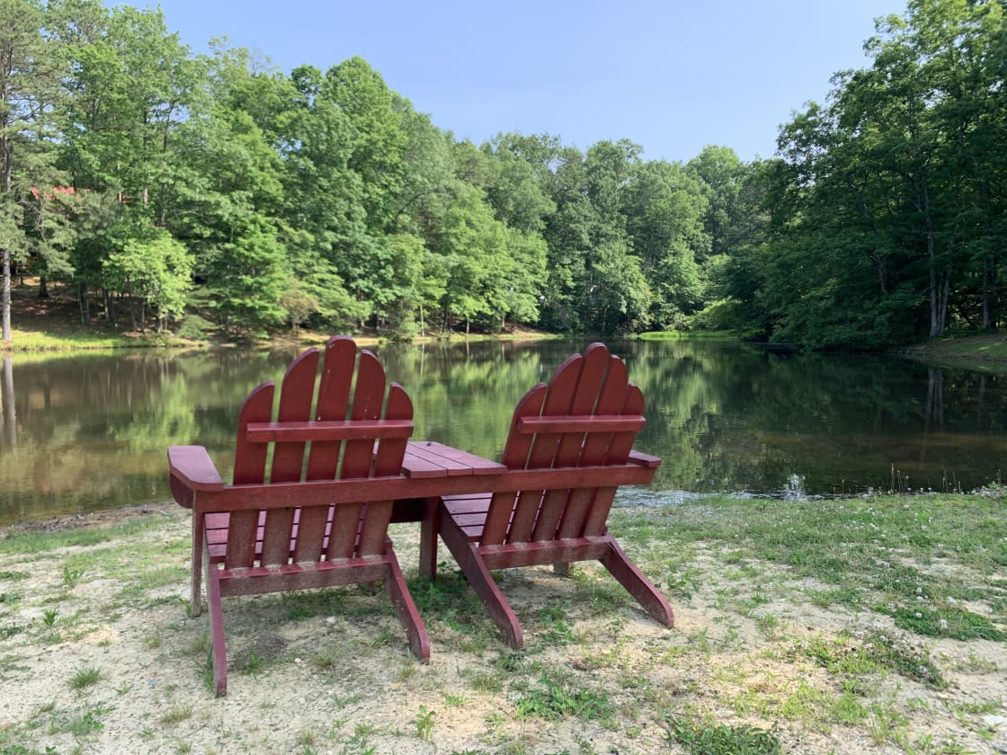 Holiday Lake with Adirondack chairs (not viewable from campsite - it is 1/4 mile down the road)