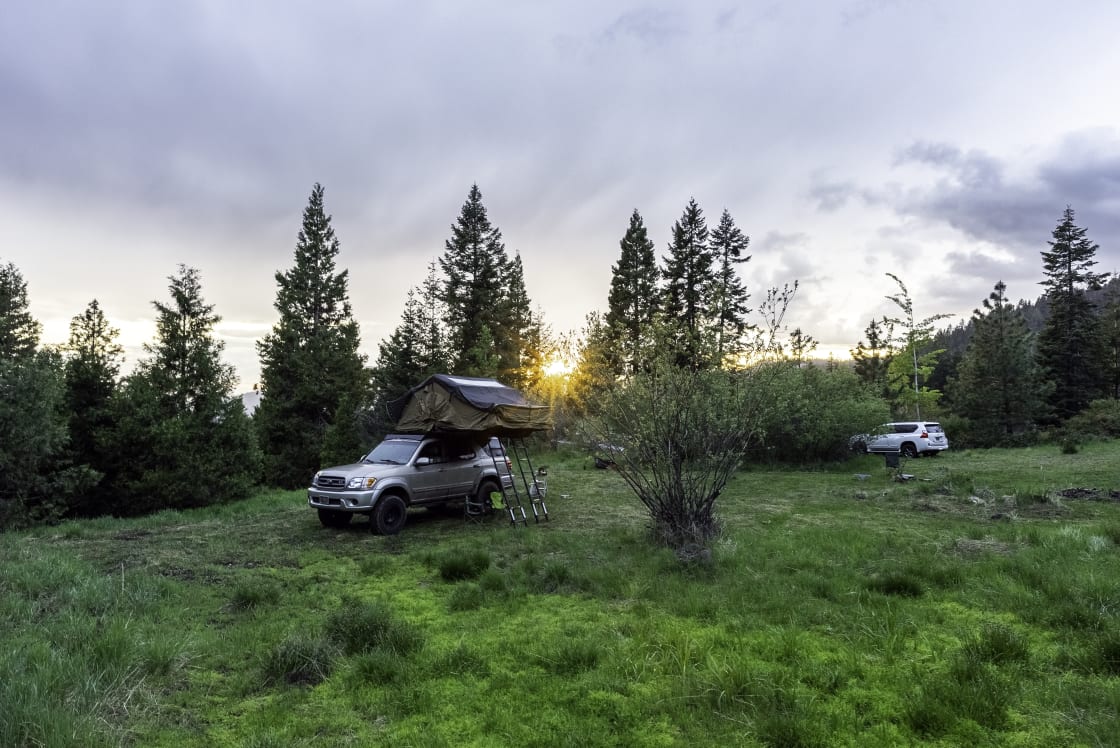 Campsite in the early Spring. Vehicle and rooftop tent are not included. 