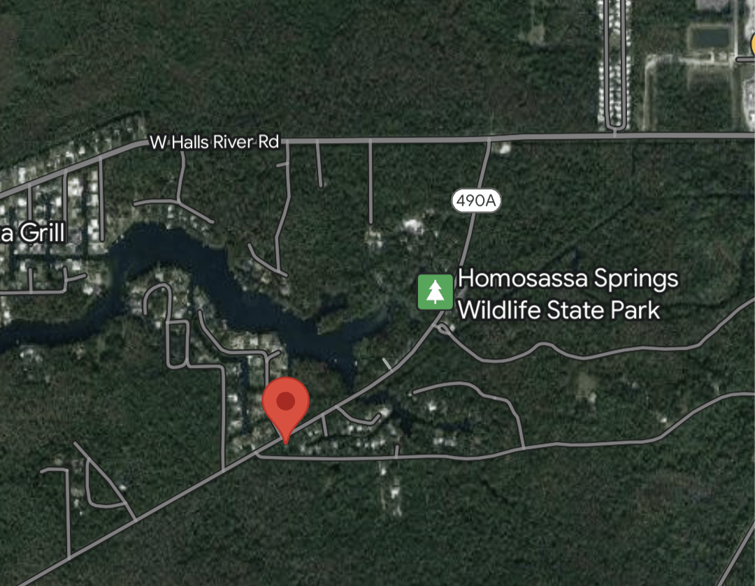 The site is located on the edge of a quiet waterfront community along the Homosassa River and next to 13 acres of undeveloped land. This site is NOT waterfront.