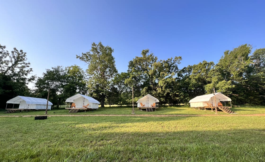 4 tents 50ft apart each tent has 2 queens for 4 campers
