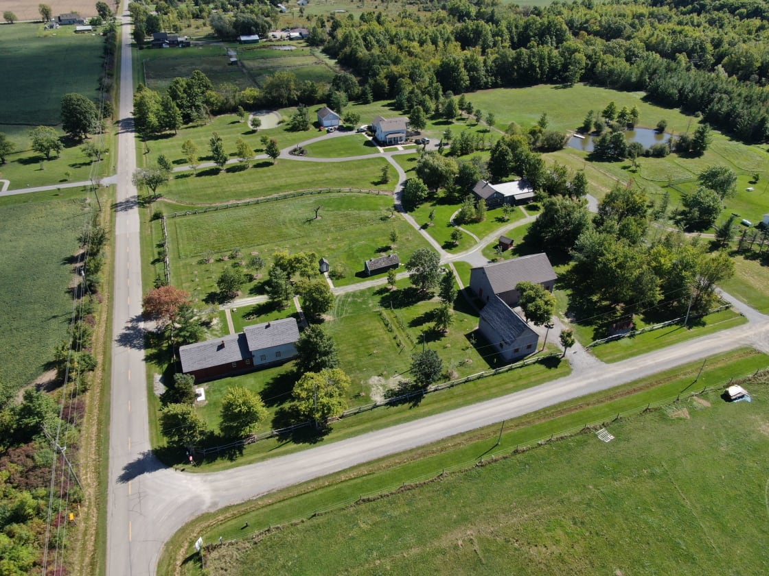 Aerial View of Heritage Homestead and Woodlands camping area
