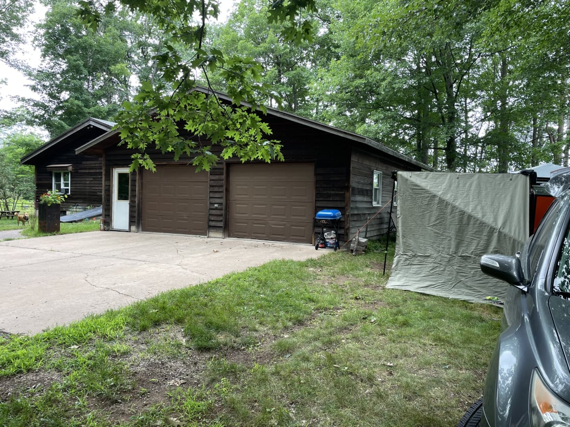 The main dry camping site is immediately adjacent to the owners garage. 