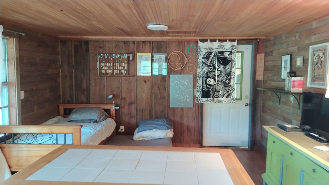 The back pine room also has two beds for your large group. Can be used as a daybed couch and the trundle can be stored under the bed if it's not needed.
