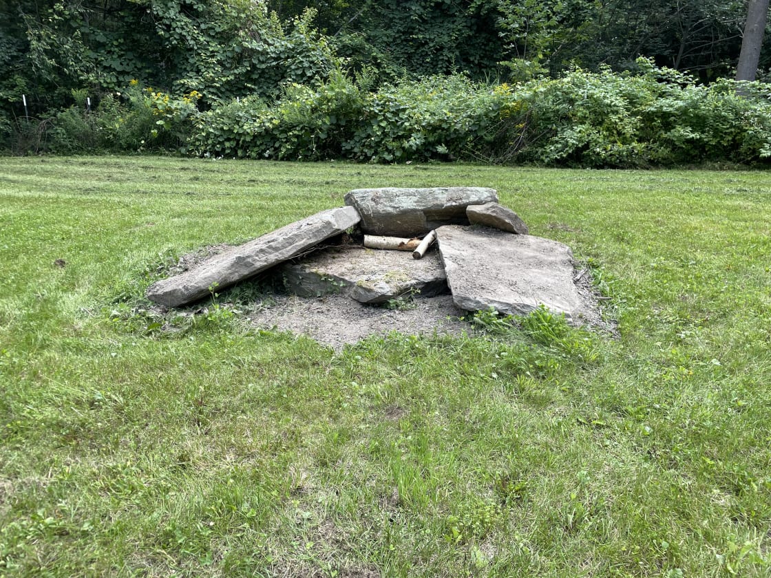Fire pit made with stones from the property - wood is provided