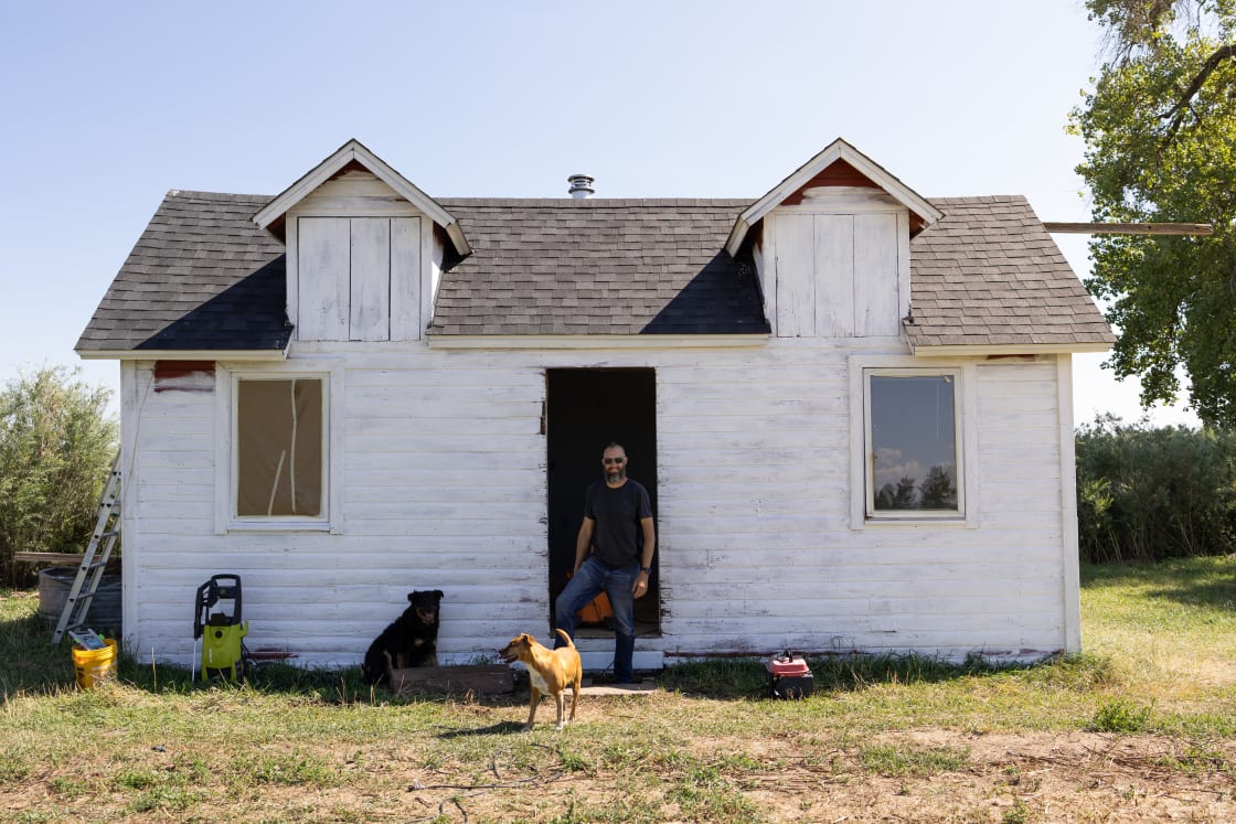 This is Jax and his two dogs, he’s a family friend of the hosts doing construction to build the general store (the building shown) which will be an amazing amenity for the site! 