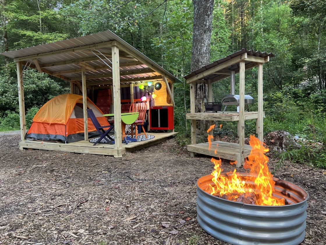 Tent setup, charcoal grill, pizza oven, fire pit