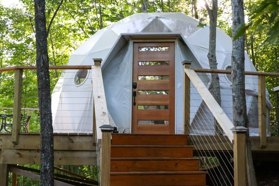 April's Treetop Dome has a beautiful set of stairs and deck! 