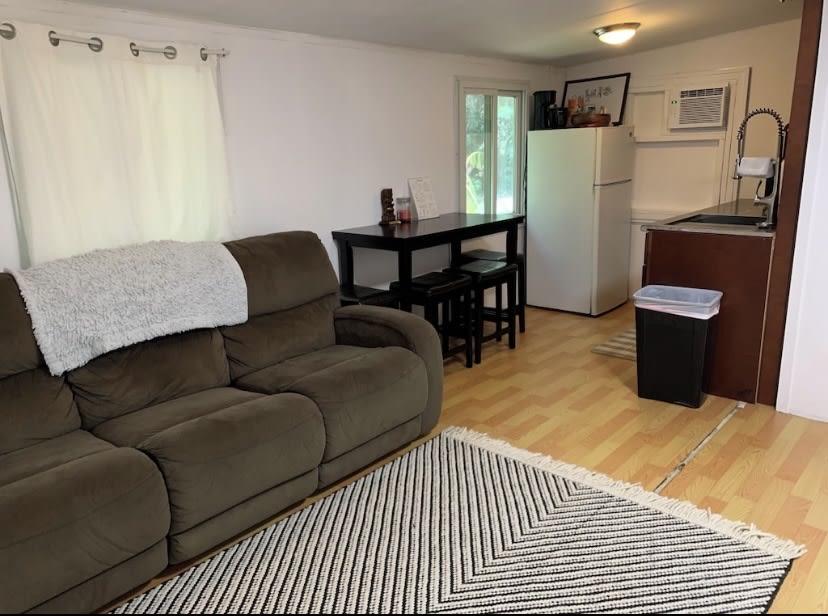 Comfortable couch, cool AC, half kitchen, dining area
