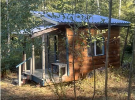 Alder tiny cabin with porch. A reader and writer's paradise.