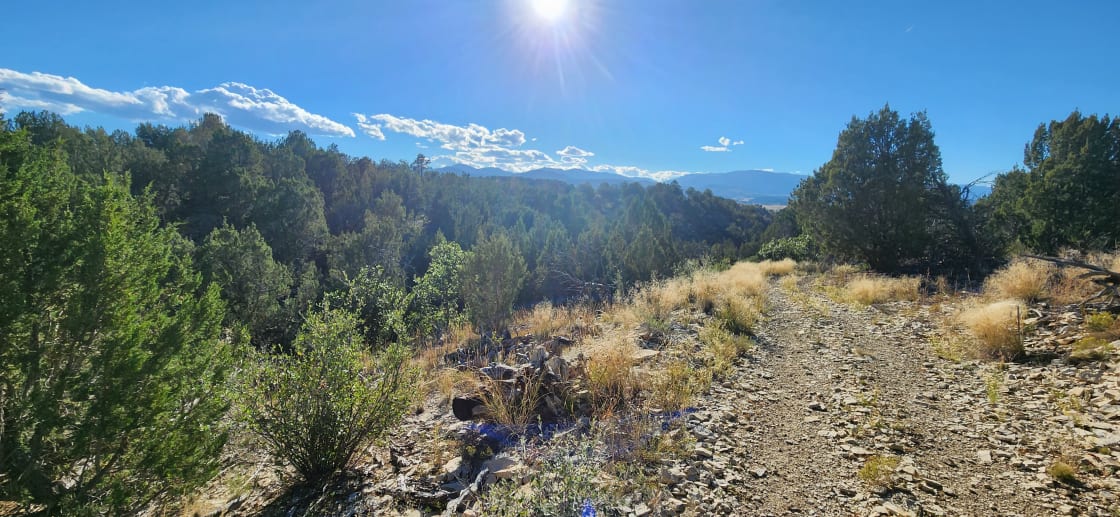 Old highway 96 is a double track trail that gently slopes down the first hill to access the other three steep mountains if you choose to hike or conti
