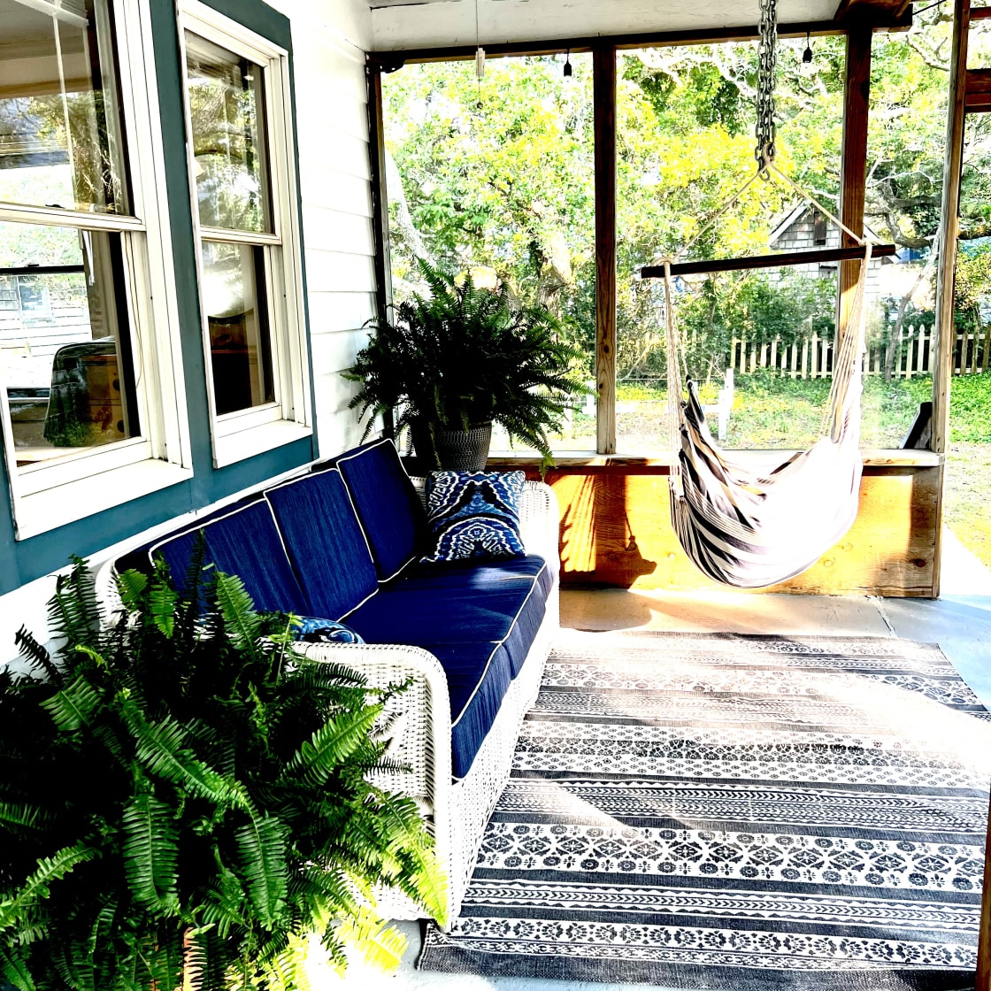 The screened in porch is the perfect spot anytime on the island !  Even napping on the sofa ! 