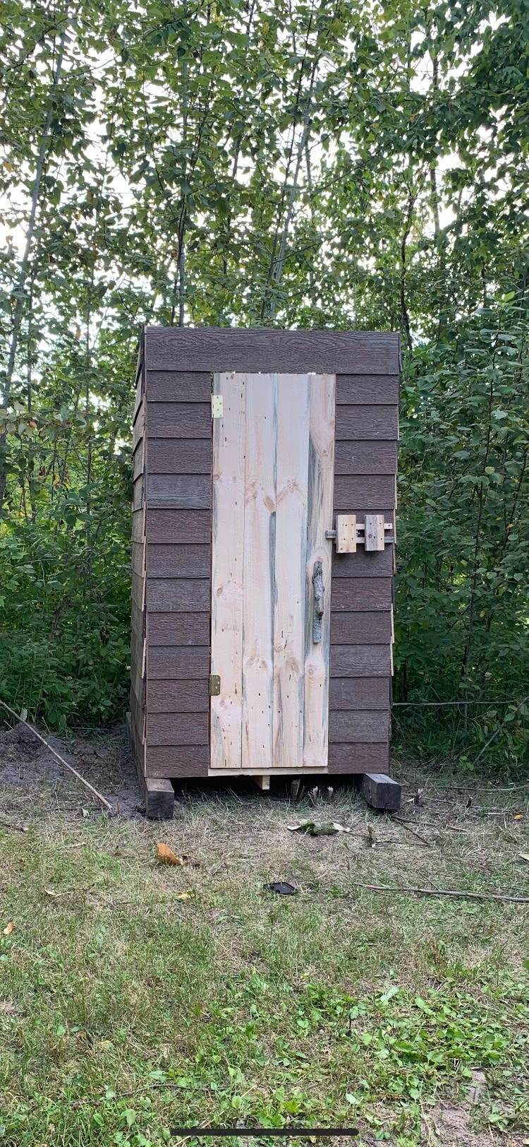 Outhouse for your use while staying at the Wolf Lake woods rustic retreat!
