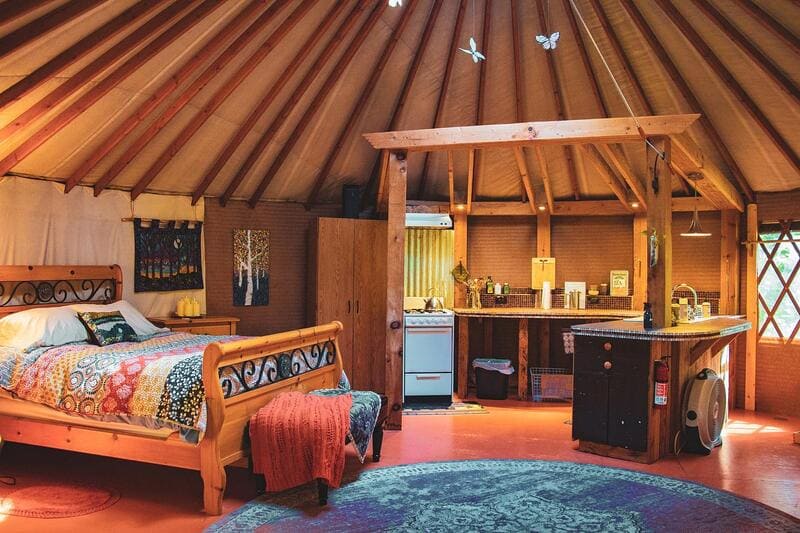Paisley Paradise Yurt queen bed and kitchen