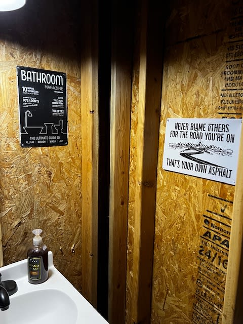 June’s great signs entertain and educate you while in the bathroom!  Loved it. Great sense of humor. 