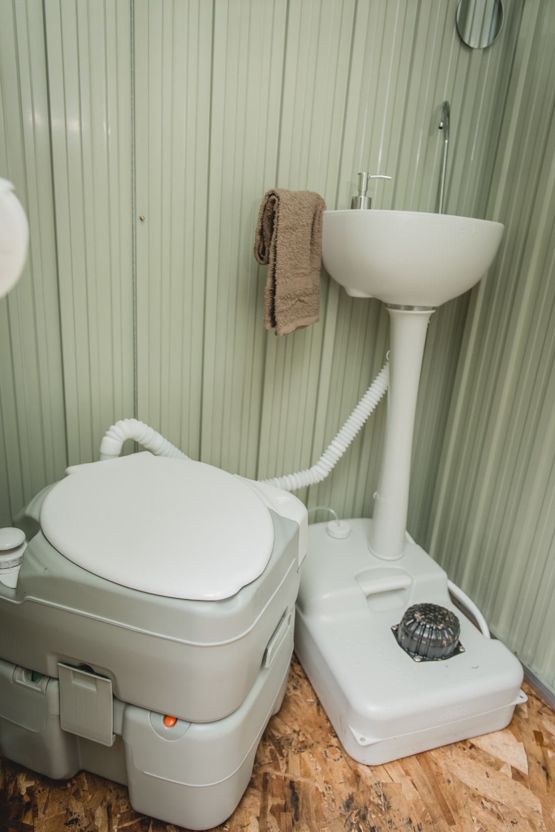 Inside bathroom - compostable toilet & pumping sink. 

Photo provided by @kaitmckayphotography