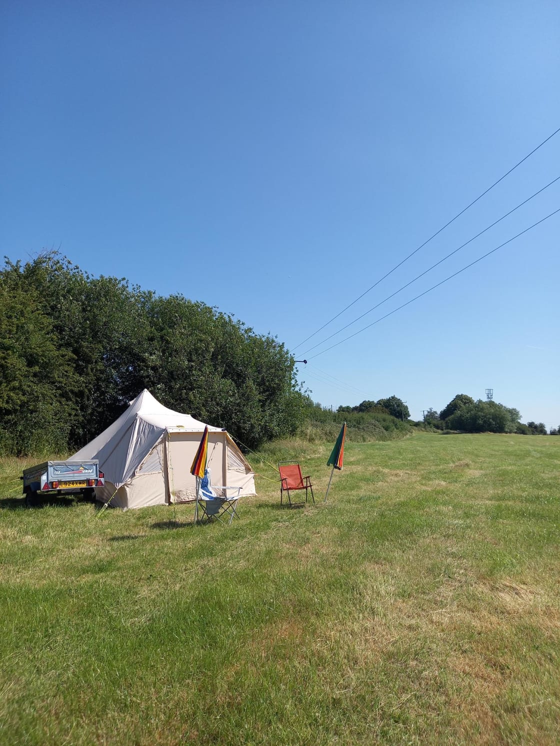 Tent Pitch - an example of how spacious the pitches are, no fences, just open field. Have as much space as you like!