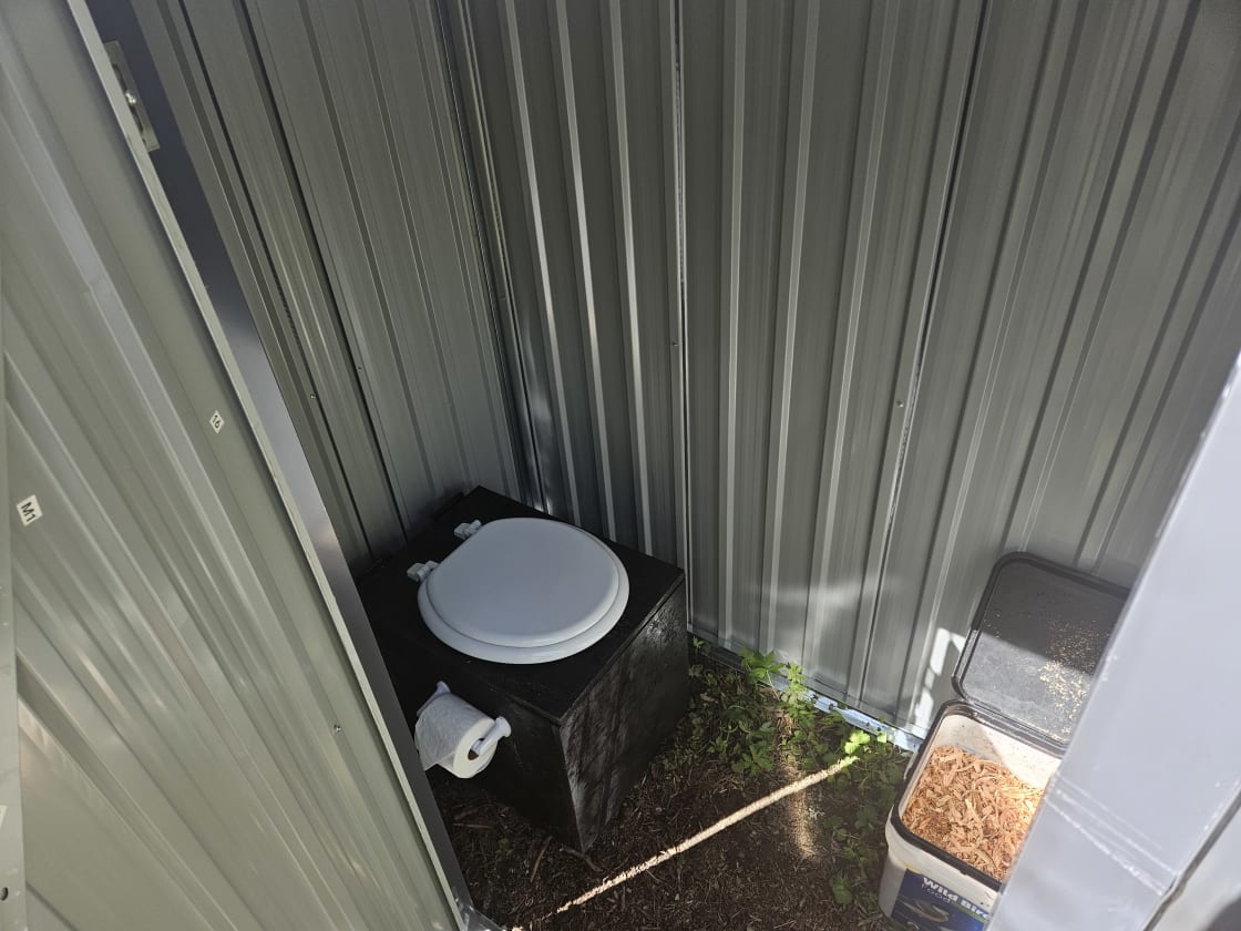 This is a community compost toilet for all campers at all camp sites. It is located off of the main trail at the back of the property. The sawdust is used to cover the waste in order to reduce odor.