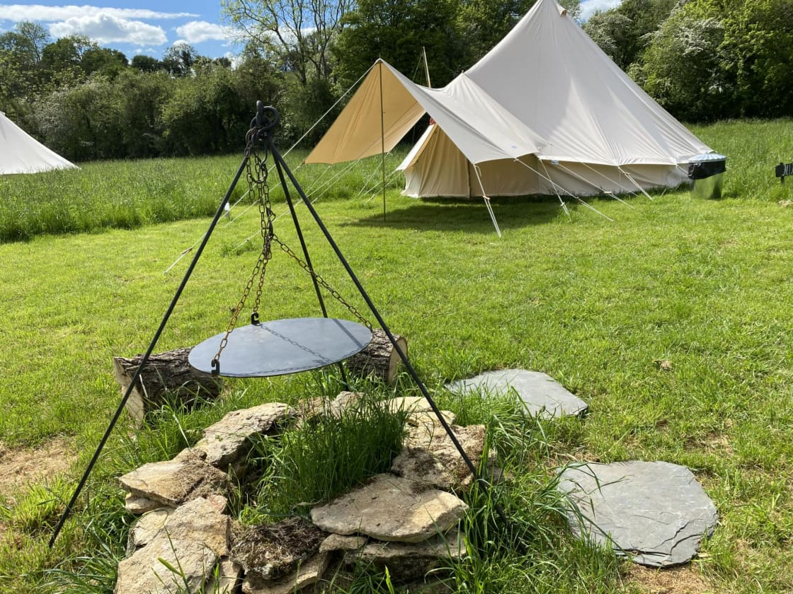 Bell Tent - Mimi each bell tent has a firepit with fire cooking equipment outside