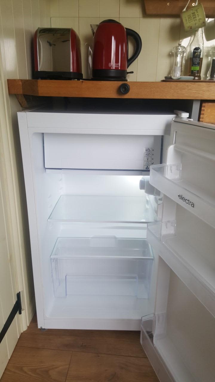 Plenty of space in the fridge including a small freezer box. 