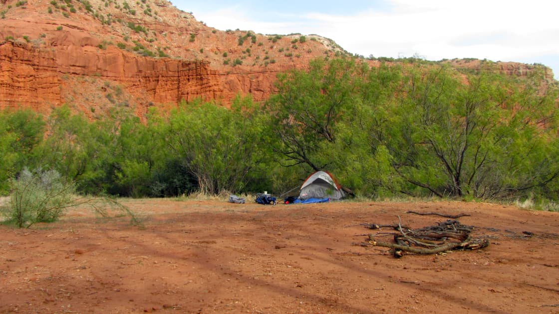 A communal pad makes up the primitive campground with sites along the perimeter. Photo by Lisa Rawlinson