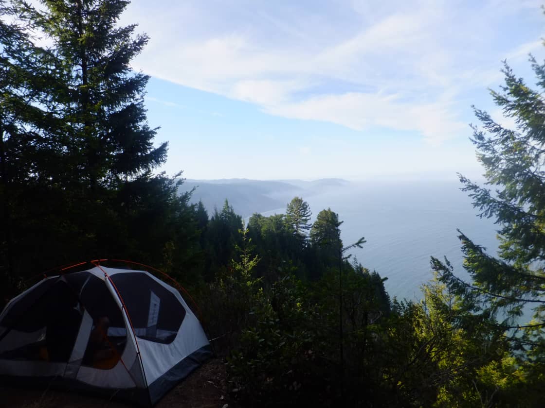 Fellow camper set up camp right on the bluff's edge. Most epic view from a camp site.