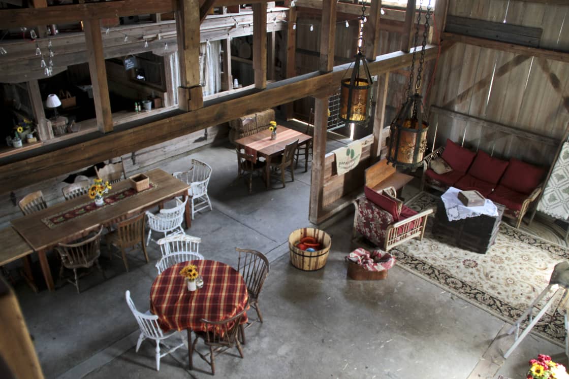 Plenty of space for dining and hanging out on the main floor of the barn.