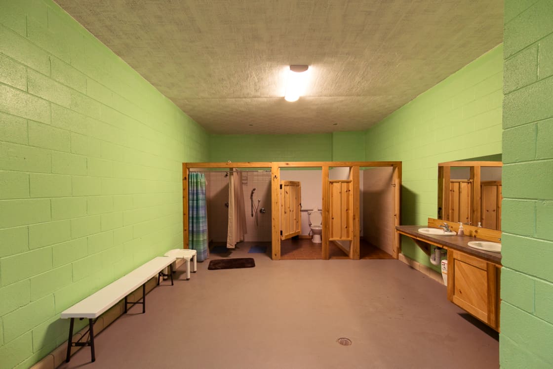 A spacious, clean bathroom provides modern facilities. 