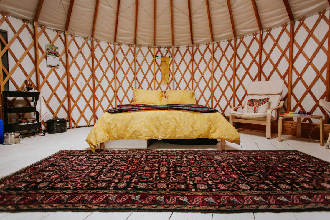 The yurt feels incredibly spacious, warm and inviting.