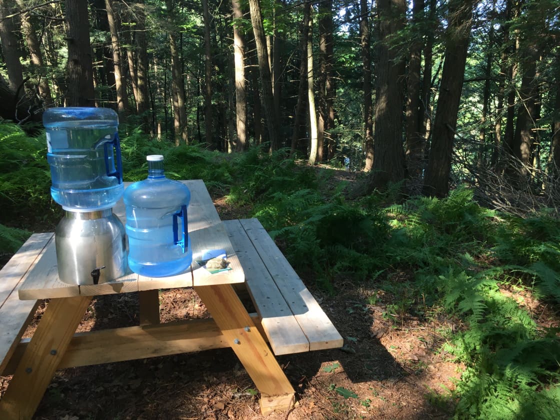 Water is provided. Welcome packet with additional information is also left for you on picnic table.  