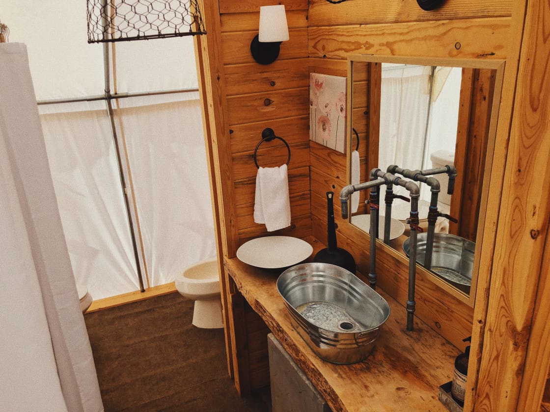 Private bathroom inside of “dirty dog” yurt