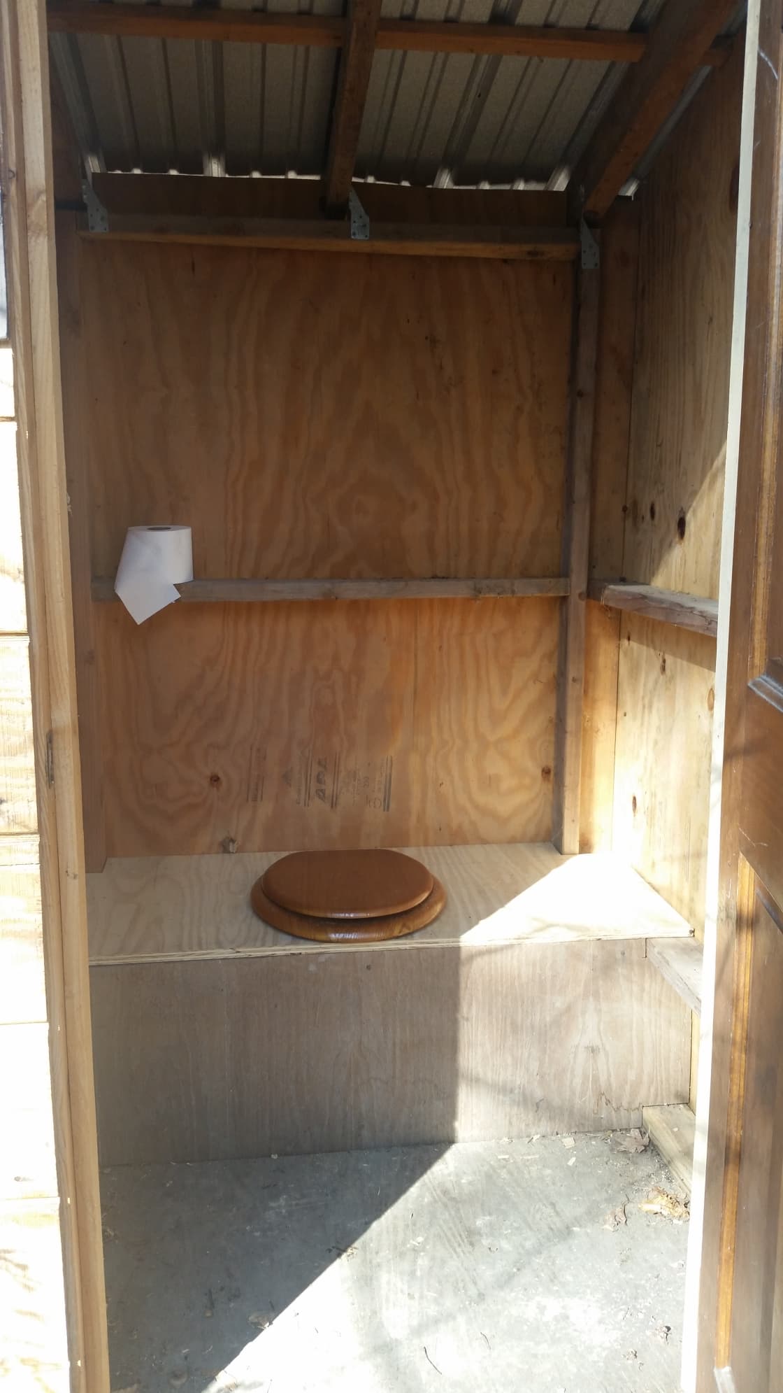 Composting outhouse