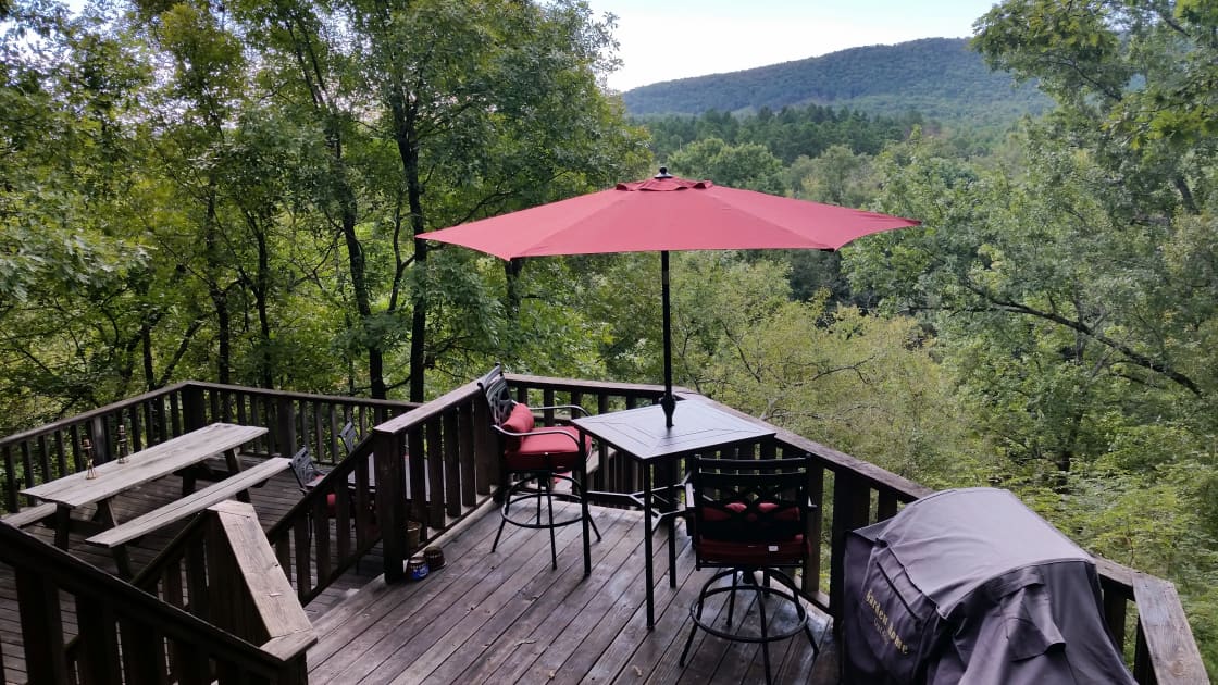 Eat, read, relax on the 3-tier deck overlooking the river.  The grill is available to use as well.