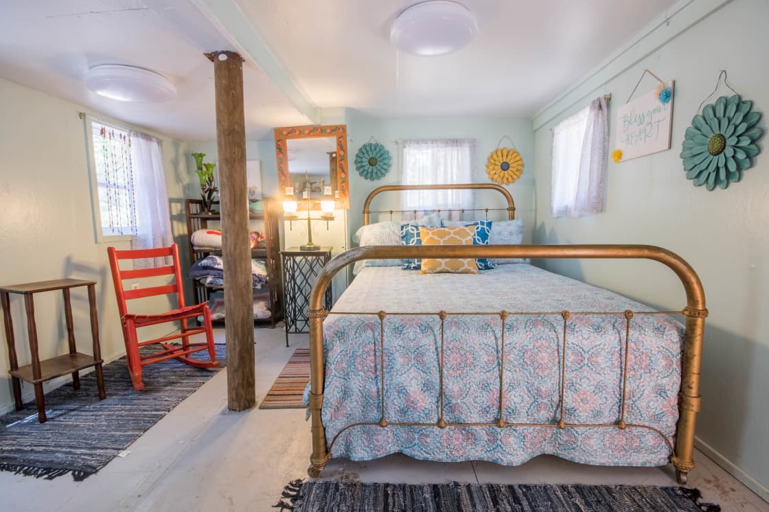 The main room is adorable and has all the amenities you need for a relaxing river cabin stay